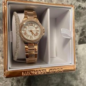 MK watch color rose gold size small to medium